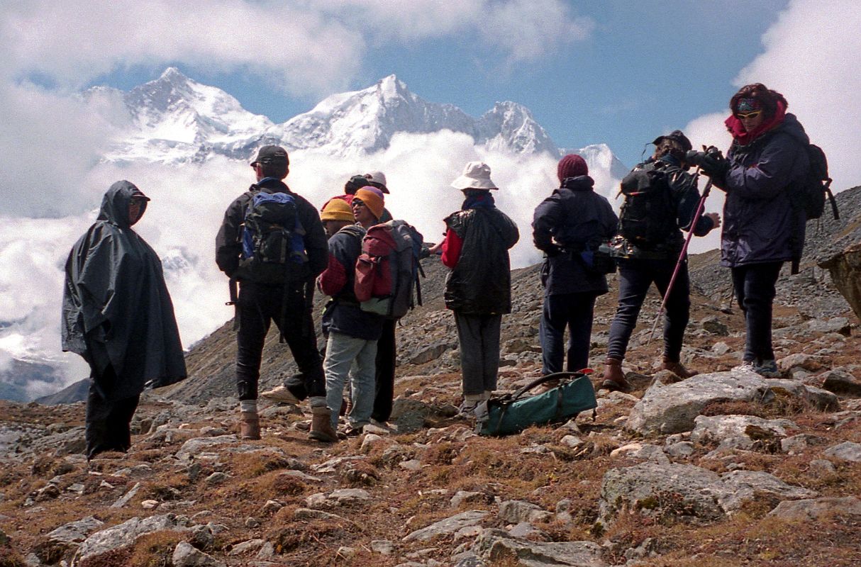 19 Our Trekking Group On Shao La Watching As Makalu And Chomolonzo Starts To Come Out Of The Clouds